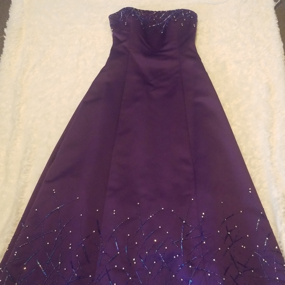 Purple beaded strapless evening gown